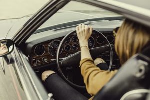 teen driving a car
